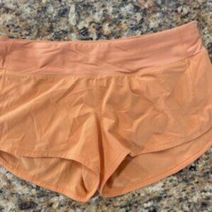 lululemon light orange size 6 speed short 2.5 gently worn